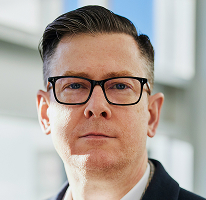 Kriptovaliutų prekybos bendrovės vadovo, generalinio direktoriaus Alexander Hughes, portretas